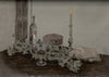 Featured image for What will you carry through to the new year: a drawing of an old-world Christmas table with holly, candle, wine, fruit cake and a bird