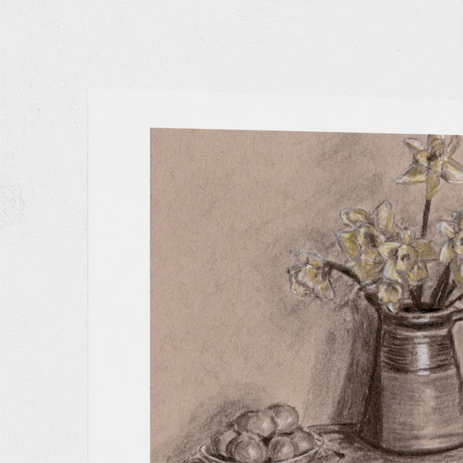 A still life art print featuring yellow daffodils in a dark ceramic pitcher, with a plate of eggs in the foreground, shown on a white paper sheet against a light grey background.