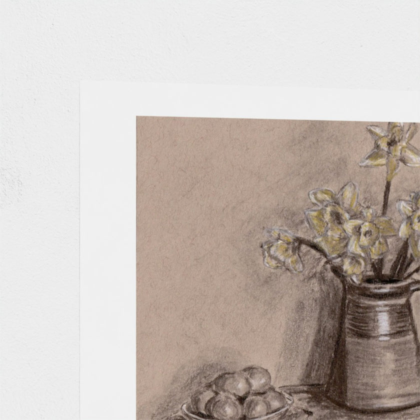A still life art print featuring yellow daffodils in a dark ceramic pitcher, with a plate of eggs in the foreground, shown on a white paper sheet against a light grey background.