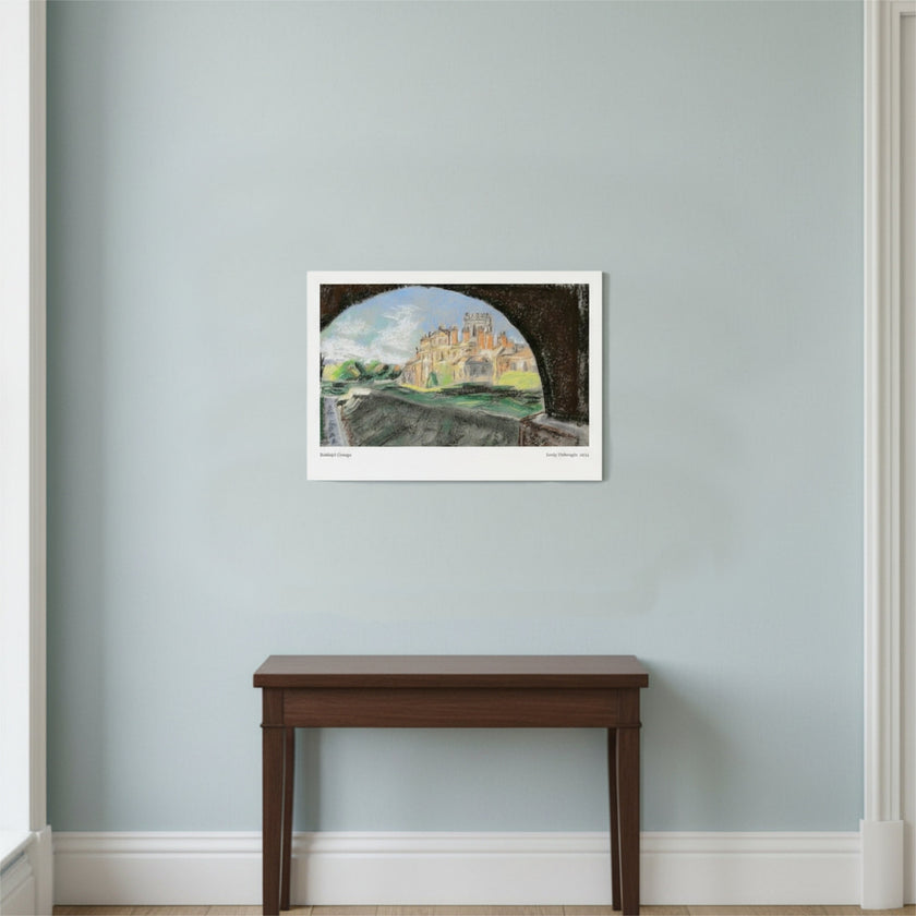 An art print of Biddulph Grange on a blue wall above a dark wood table