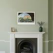 An art print of Biddulph Grange on a green wall above a white fireplace