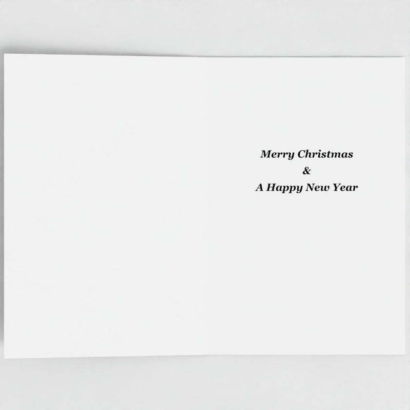 A minimalist white greeting card with elegant black serif text reading 'Merry Christmas & A Happy New Year' positioned on the right side, shown against a neutral light grey background.