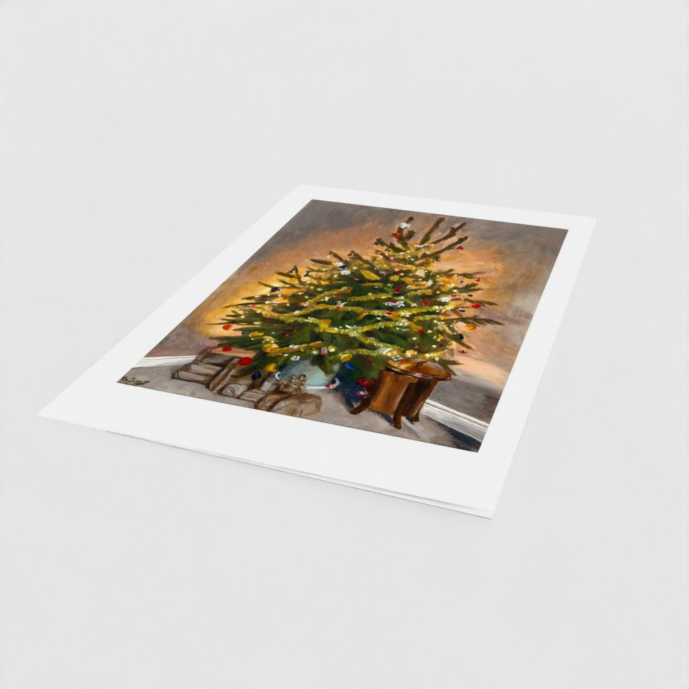 A greetings card with a wide white border showing an impressionistic painting of a decorated Christmas tree, displayed on a light gray background.