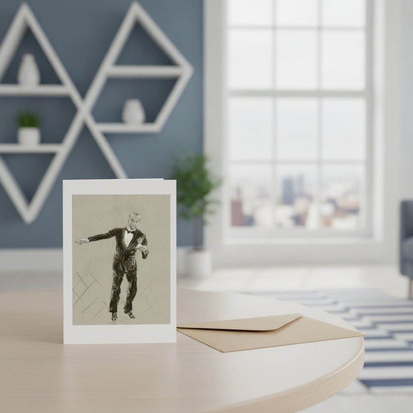 A vertical greeting card featuring Fred Astaire standing on a light wood table next to a matching envelope. The background shows a modern room with a blue wall, white geometric shelves, and a large window.