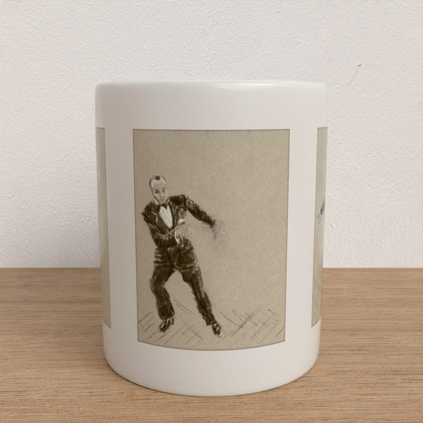 A white ceramic mug with a vintage-style sepia sketch of a man in a tuxedo, displayed on a light wood surface against a textured off-white wall.