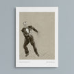A framed art print featuring a sepia-toned sketch of a man in a tuxedo, displayed against a light gray background. The print includes a white border with small text at the bottom reading 'Fantastic Fred Astaire No.
