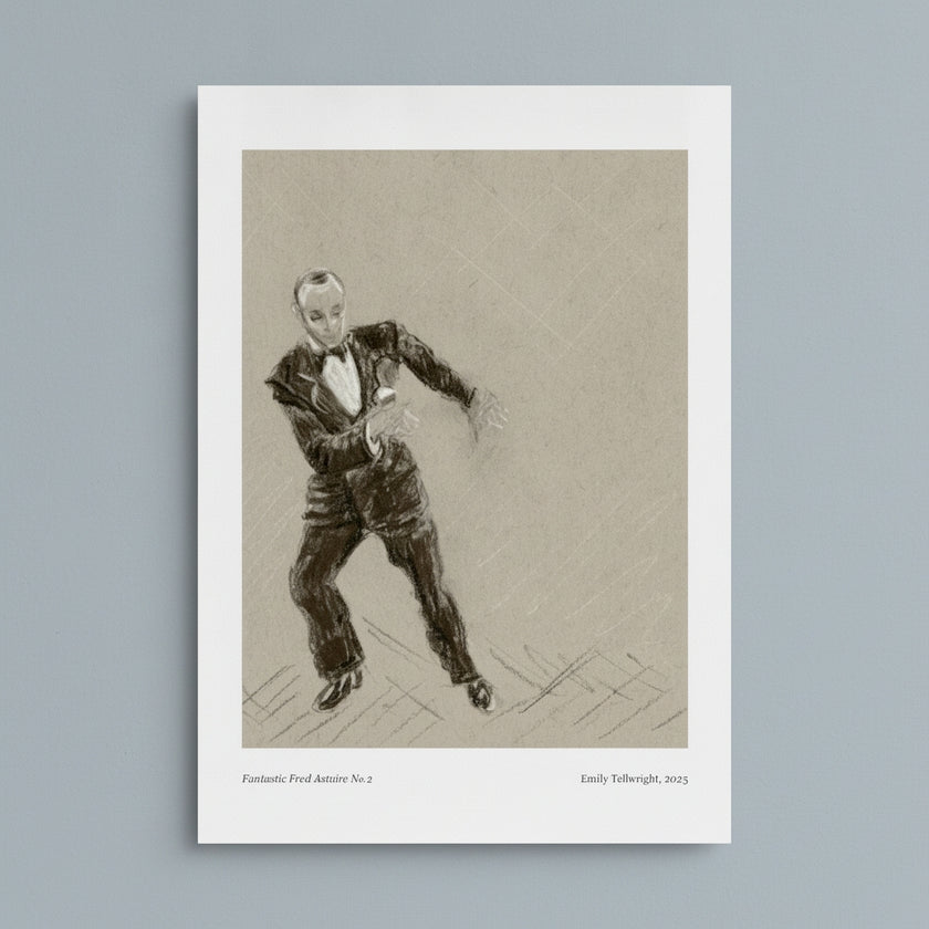 A framed art print featuring a sepia-toned sketch of a man in a tuxedo, displayed against a light gray background. The print includes a white border with small text at the bottom reading 'Fantastic Fred Astaire No.