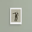 A framed art print featuring a sepia-toned sketch of Fred Astaire on a white border, displayed against a solid sage green background.