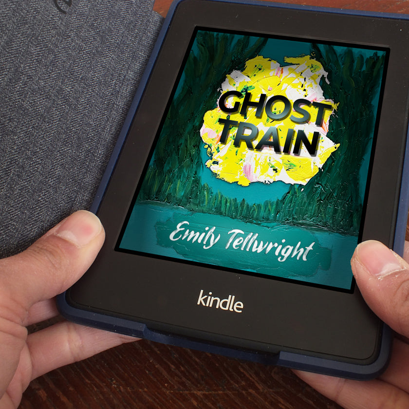 A kindle in a case held in someone's hands showing the cover for Ghost Train ebook by Emily Tellwright