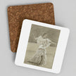 Two square cork coasters with rounded corners, one plain brown and one printed with a sepia-toned sketch of a dancer, shown on a light gray background.