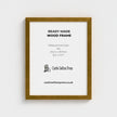 A gold wooden picture frame shown against a light gray background, with printed text inside reading 'READY MADE WOOD FRAME' and 'Castle Sefton Press'.