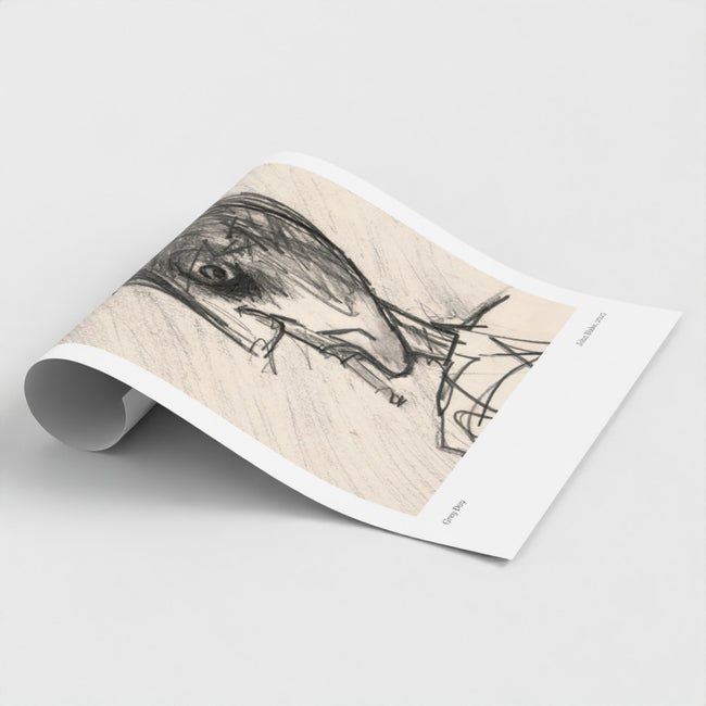A rolled-out art print or poster showing a monochrome portrait of a smoking person, photographed on a clean light grey background.