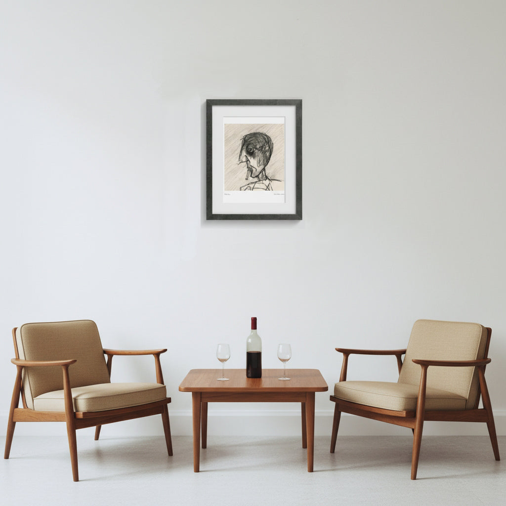 A framed black and white sketch portrait of a person hangs on a white wall above a mid-century modern wooden coffee table, flanked by two matching armchairs with beige cushions. A bottle of red wine and two wine glasses sit on the table.