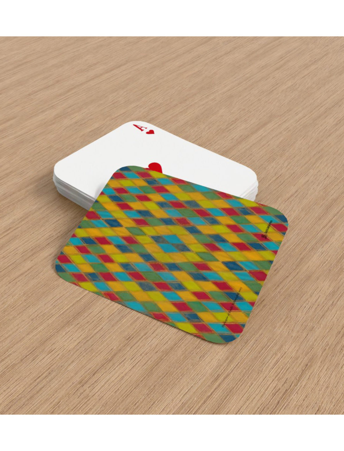 Harlequin playing cards featuring a handpainted design by Emily Tellwright