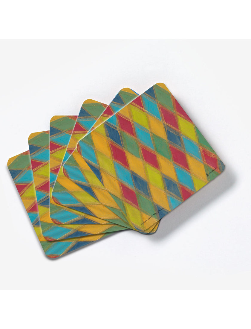 Harlequin coaster. A wood and cork drink coaster designed by Emily Tellwright