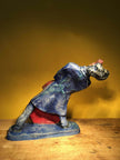 Ceramic sculpture of bass player.