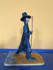 Ceramic sculpture of a Pilgrim Father preacher