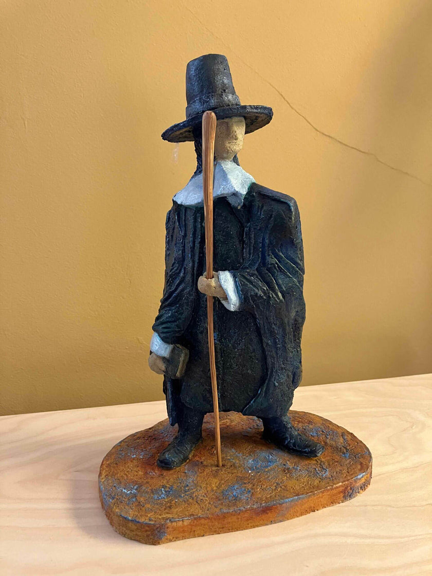 Ceramic sculpture of a Pilgrim Father preacher