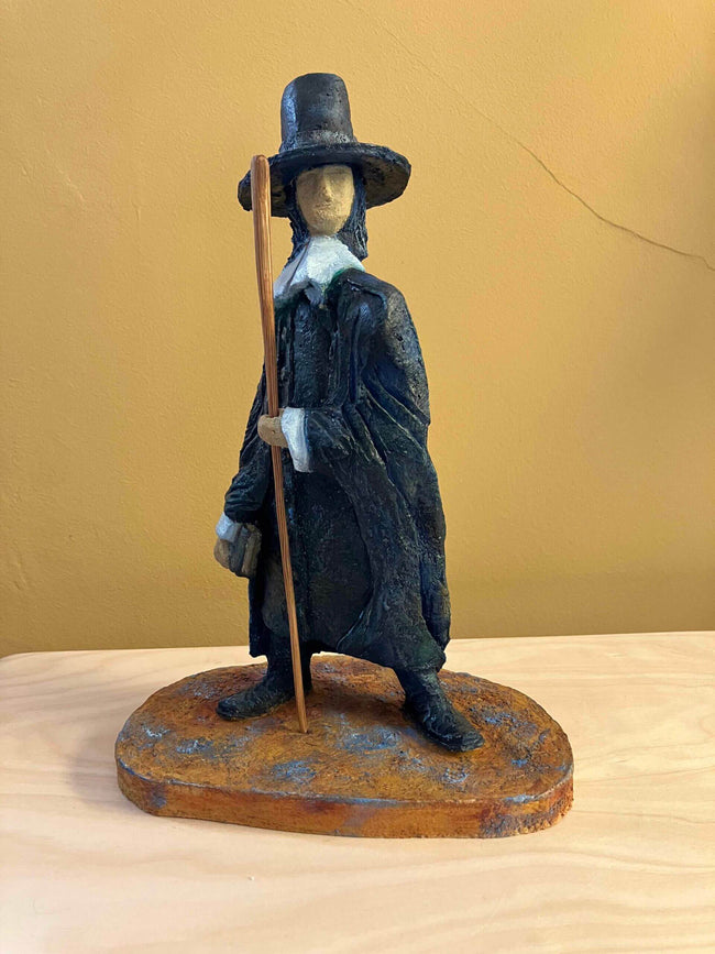 Ceramic sculpture of a Pilgrim Father preacher