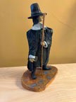 Ceramic sculpture of a Pilgrim Father preacher