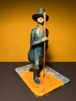 Ceramic sculpture of a Pilgrim Father preacher