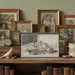 A greetings card showing sketch of flowers and fruit against a backdrop of old black and white photos