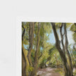 A close-up of a textured oil painting depicting a sunlit forest path with tall trees, shown with a white border on a white background.