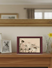 Chance the Staffordshire Bull Terrier Greetings Card on a mantelpiece with dog photos and flowers