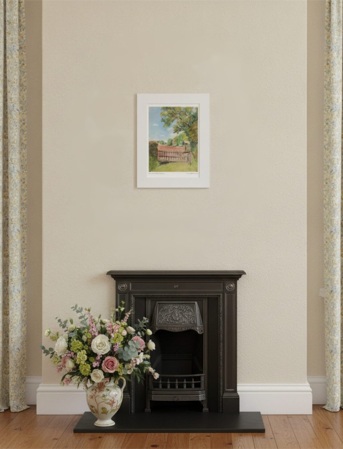 The View from St Mary's Kempley Mounted Art Print above a black iron fireplace with vase of flowers
