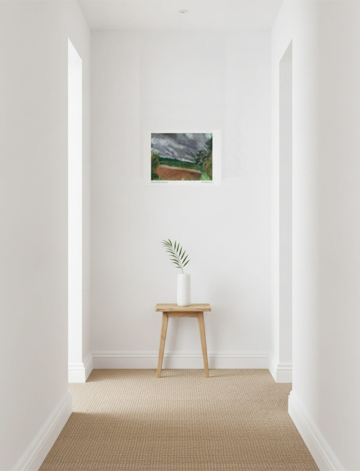 Summer Storm Near Witley Court Art print on wall above a table with a plant on