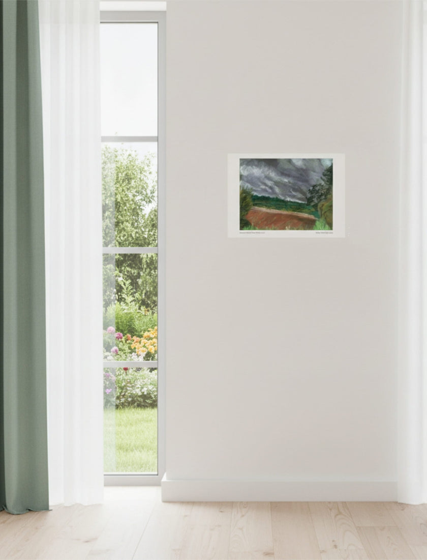Summer Storm Near Witley Court Art print on wall next to a window with green curtains