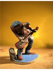 Ceramic sculpture of a punk guitarist