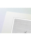 A close-up of a matted art print showing part of a pencil drawing on textured paper, with a white mat border and a pale blue-gray background.