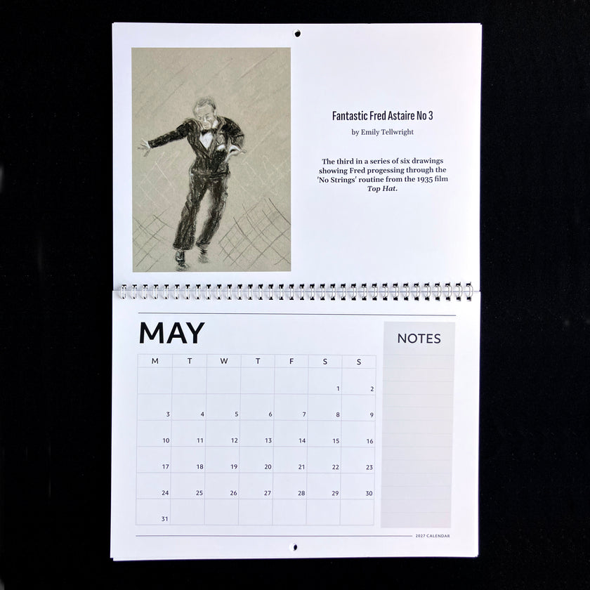 A spiral-bound May calendar page from 'Fantastic Fred Actaire No 3' by Emily tellwright, featuring a sketch of a dancer and a calendar grid with a notes section, photographed against a black background.
