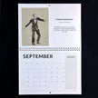 A vintage September  spiral-bound calendar page featuring a black-and-white illustration of Fred Astaire in a tuxedo with the text 'Fantastic Fred Astaire No. 5' and a calendar grid below.