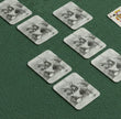 Edith the cat Playing cards laid out on green baize table