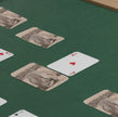 Goldie the palomino playing cards on a card table