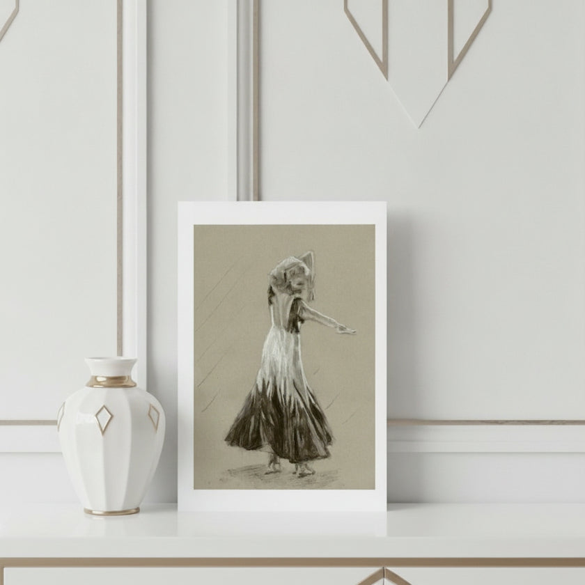 A greetings card showing ginger rogers, displayed on a white shelf next to a white ceramic vase with gold accents.