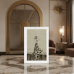 An art greetings card is displayed on a polished marble table in a luxurious, warm-toned interior setting. The print features a black-an-white drawing of ginger Rogers