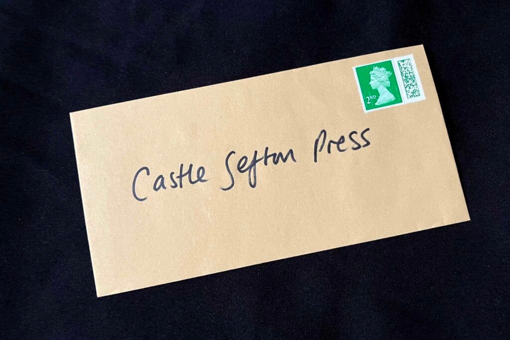 An envelope addressed to Castle Sefton Press