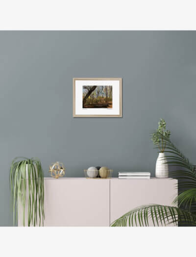 A pastel drawing of a woodland in winter.