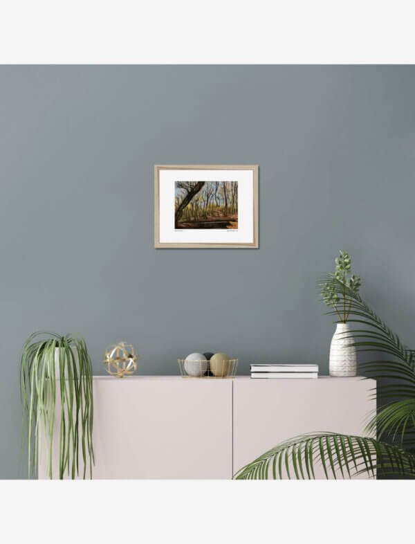 A pastel drawing of a woodland in winter.