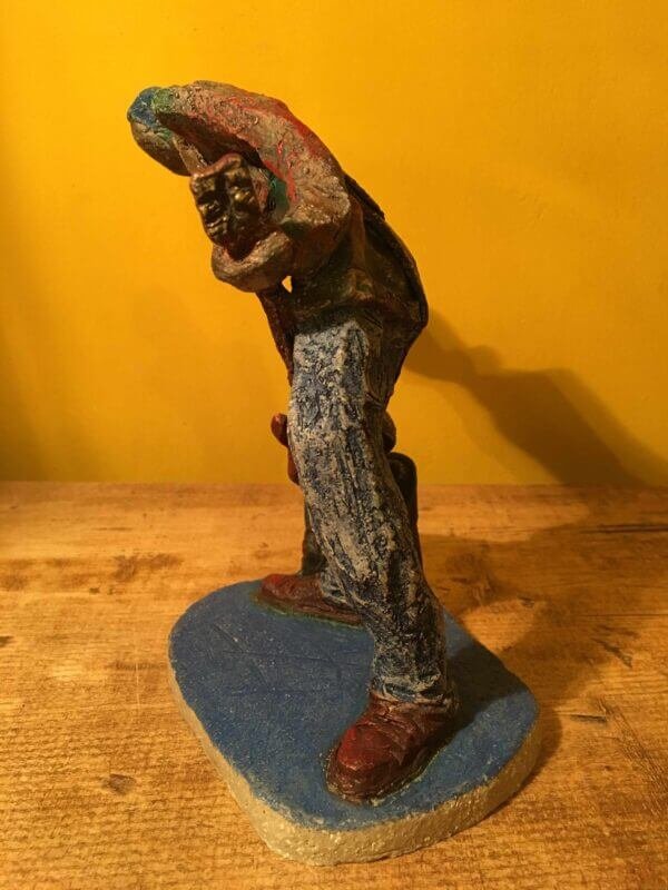 Ceramic sculpture of a punk guitarist
