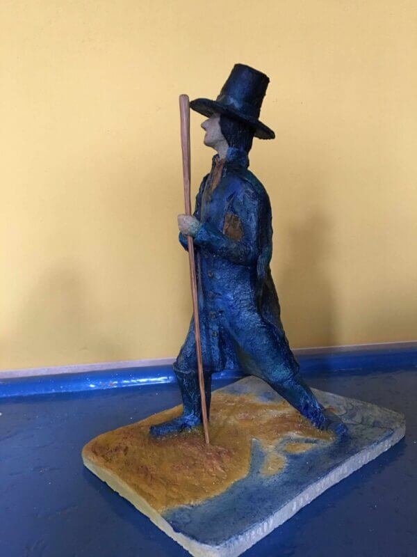 Ceramic sculpture of a Pilgrim Father preacher