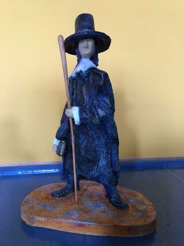 Ceramic sculpture of a Pilgrim Father preacher