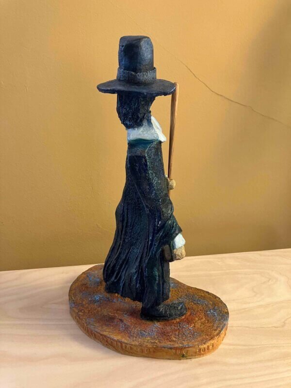 Ceramic sculpture of a Pilgrim Father preacher