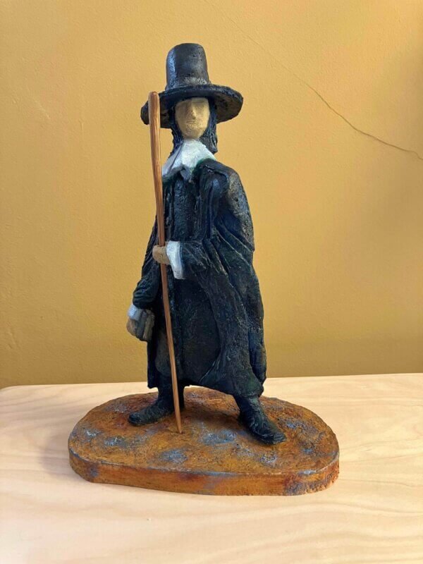 Ceramic sculpture of a Pilgrim Father preacher