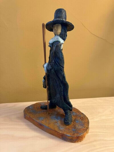 Ceramic sculpture of a Pilgrim Father preacher