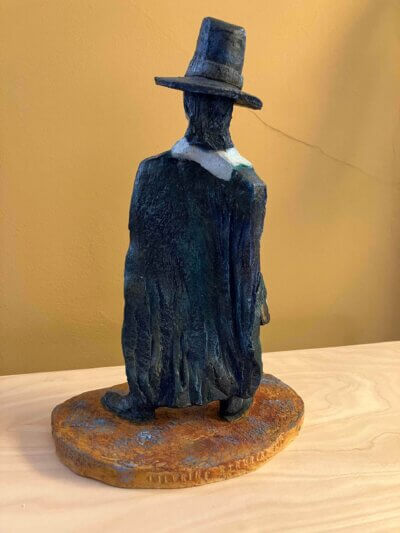 Ceramic sculpture of a Pilgrim Father preacher