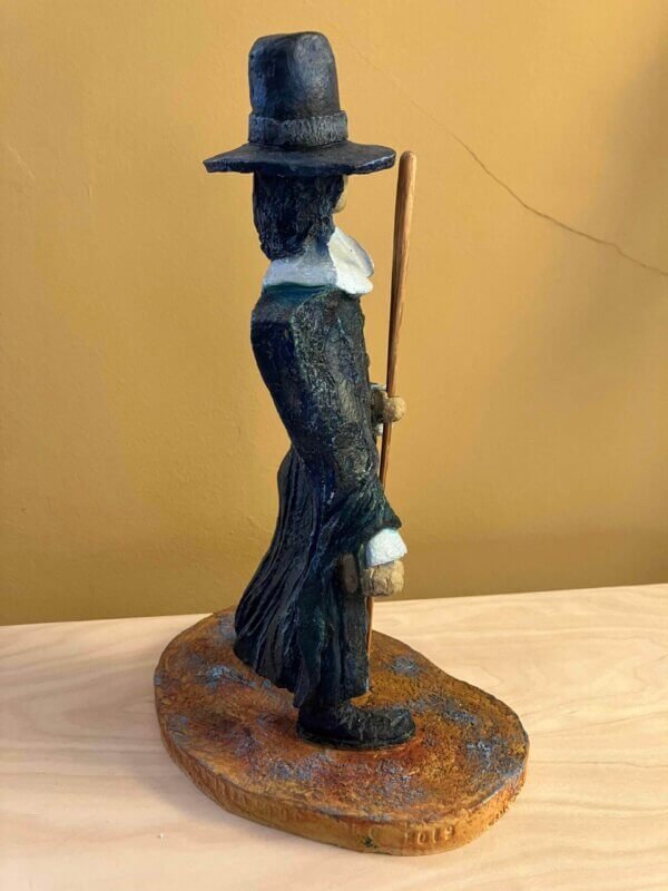 Ceramic sculpture of a Pilgrim Father preacher
